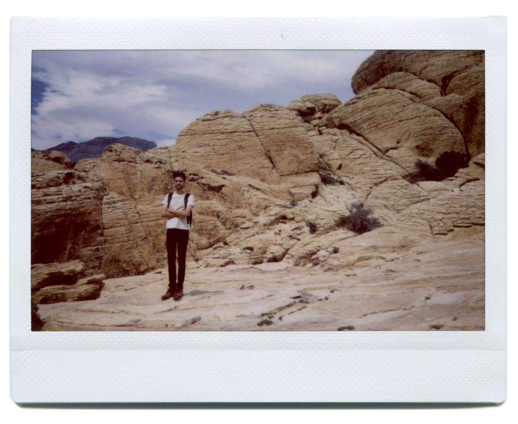 Man and Red Rocks